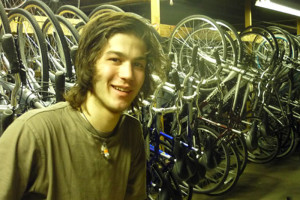 YMCA Academy student at a cooperative education placement at a bike shop