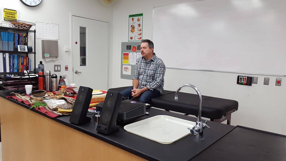 Jim Adams shows students complementary medicine methods such as massage therapy, meditation, acupuncture, and herbal remedies.