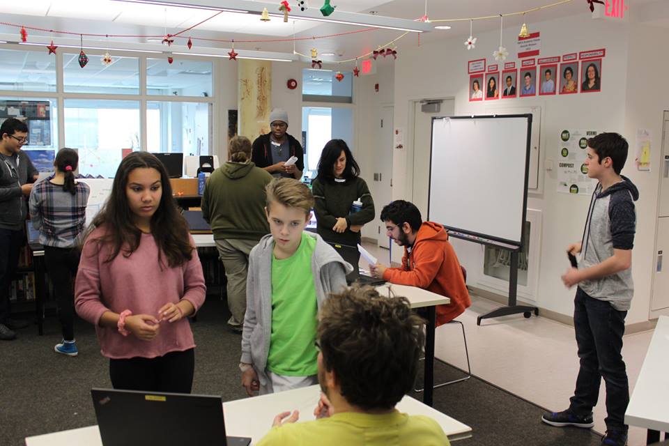 YMCA Academy students view presentations at the 2015 Social Justice Fair