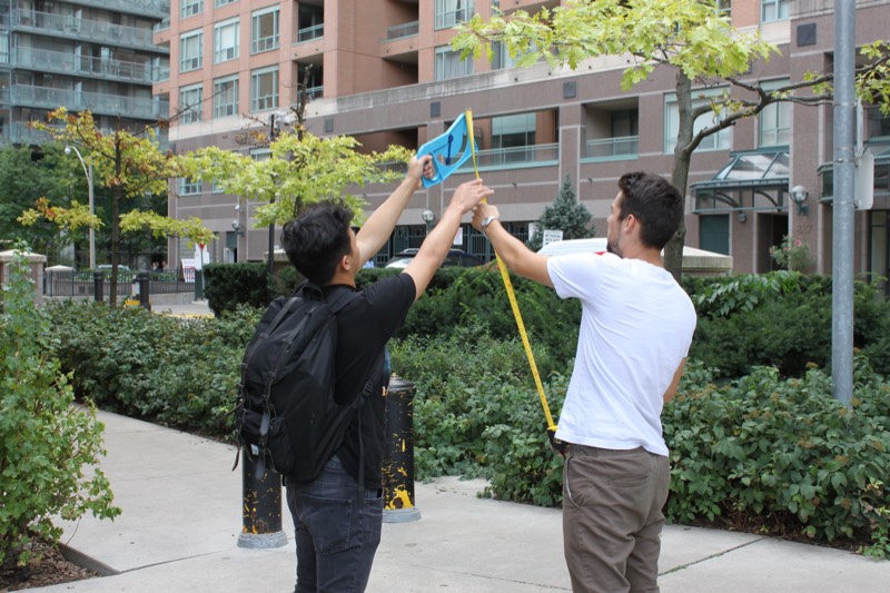 The YMCA Academy's Grade 11 College Math class took to the park to apply their skills to real world problems.