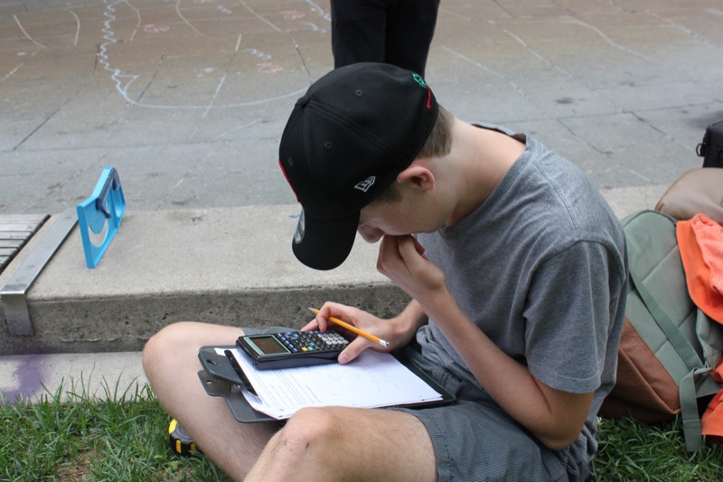 The YMCA Academy's Grade 11 College Math class took to the park to apply their skills to real world problems.