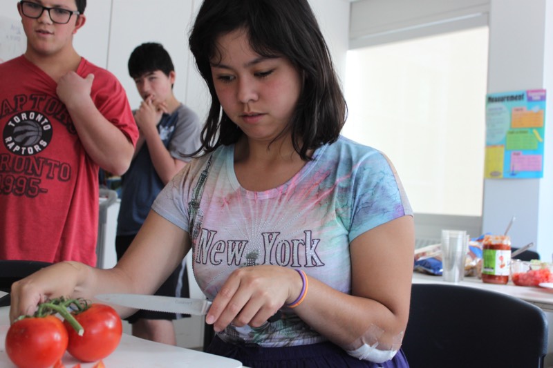 YMCA Academy students participate in Cooking Club