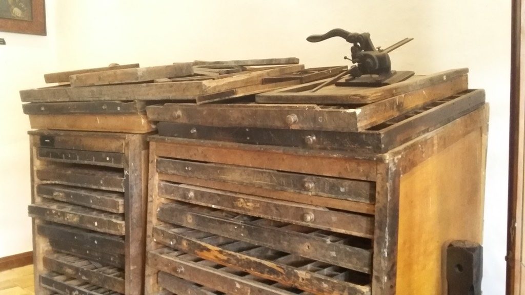 Cabinet that held the letters and numbers for the printing press