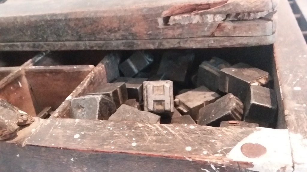 Close up of one of the drawers with letters in them