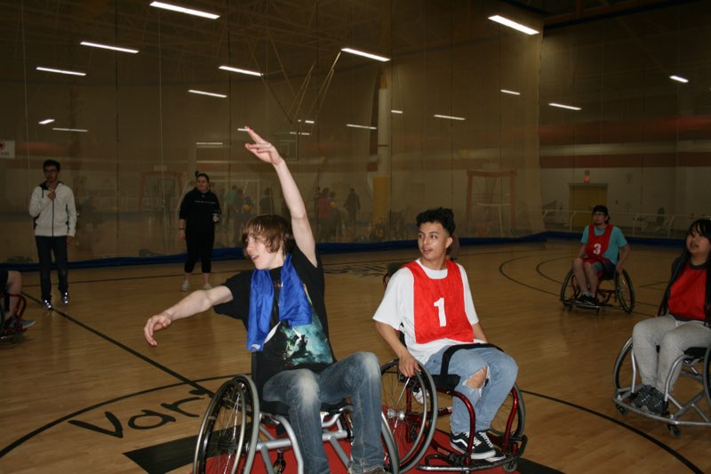 Students participate in community service at Variety Village, play wheelchair basketball, and in the evening participate in an event organized by the Professional Engineers of Ontario.