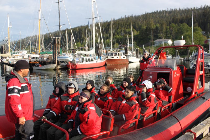 The YMCA Academy students went on a boat ride to the west coast of the island