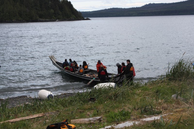 Disembarking from a "war canoe"