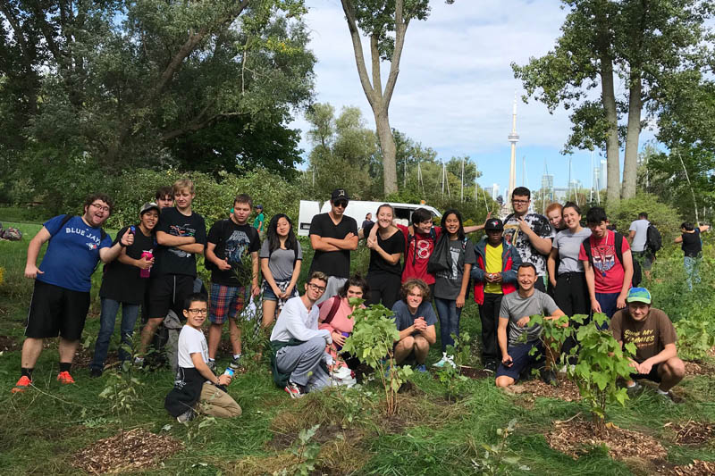 YMCA Academy students tree planting on Toronto Island