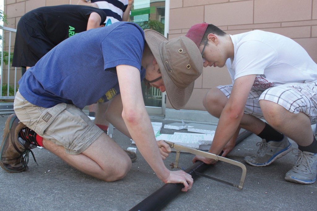 Academy students create and build the community garden