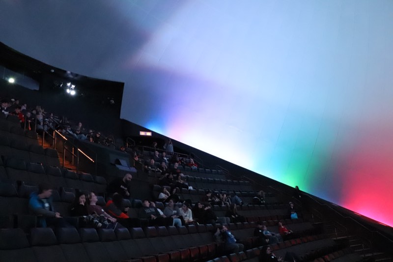 Students entering the OMNI IMAX theatre at the Ontario Science Centre