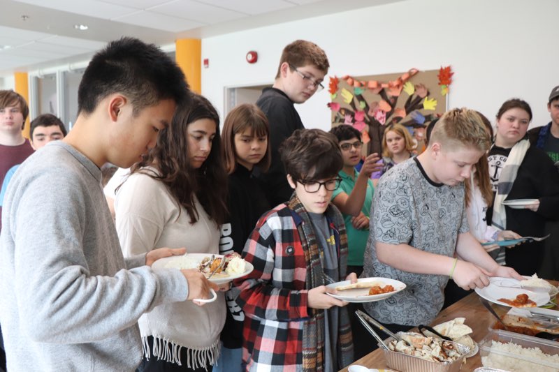 YMCA Academy students participate in the Feast of Thanks Ceremony