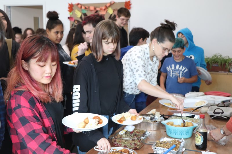 YMCA Academy students participate in the Feast of Thanks Ceremony