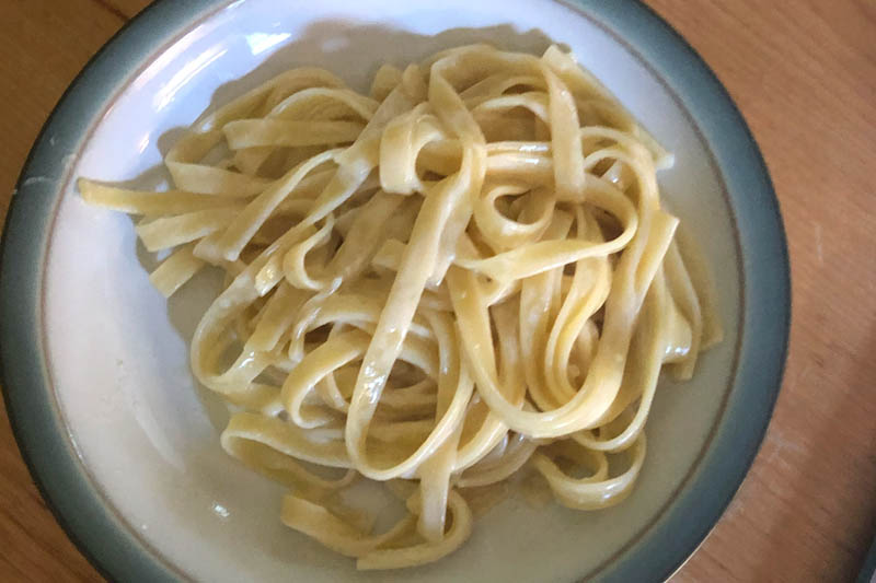 YMCA Academy students cook pasta, cookies and eggs over several cooking club weeks