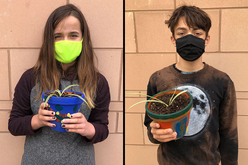 YMCA Academy Middle School students painting pots and planting their own plant