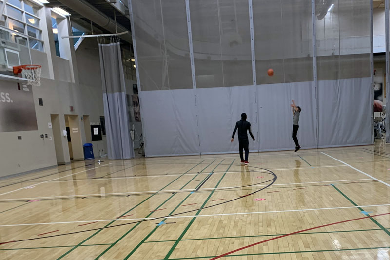 Academy staff played a friendly - socially distanced and masked - game of Basketball with two of our highschoolers.