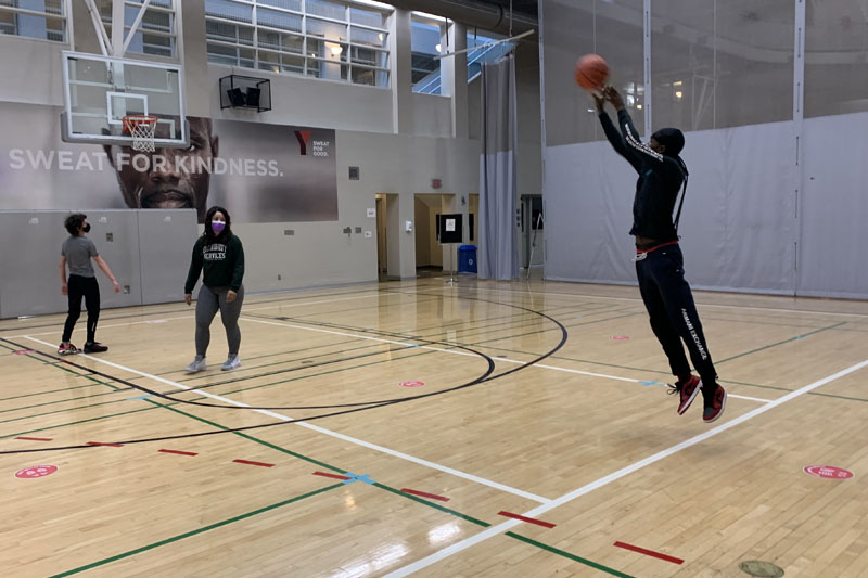 Academy staff played a friendly - socially distanced and masked - game of Basketball with two of our highschoolers.