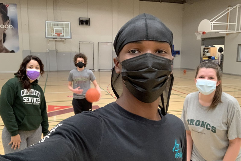 Academy staff played a friendly - socially distanced and masked - game of Basketball with two of our highschoolers.