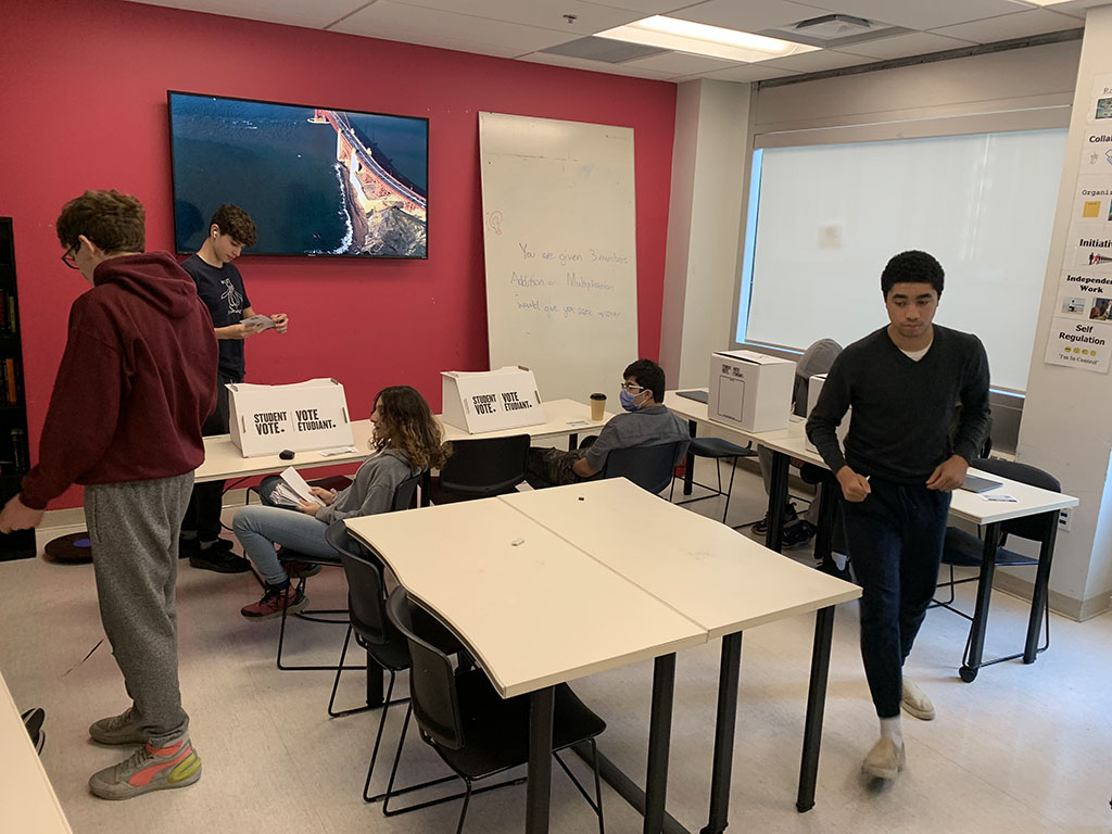 The two Civics classes in the Academy have joined together to work with Student Vote Canada to bring a realistic voting experience to the school.