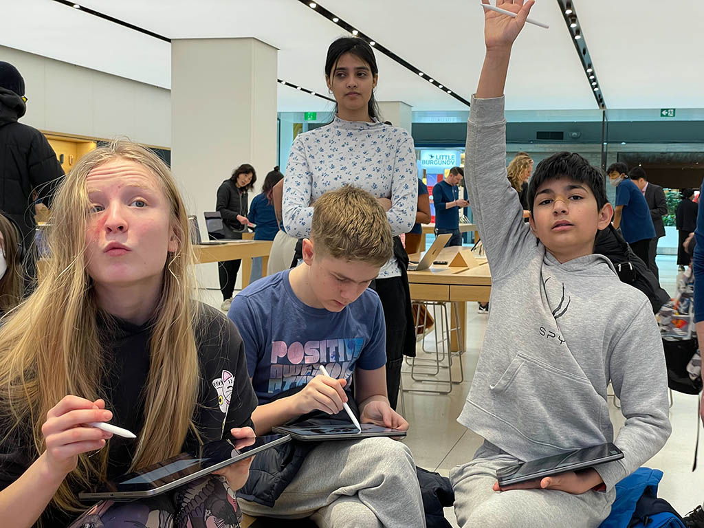 Students learning about digital art at a #TodayatApple Workshop.