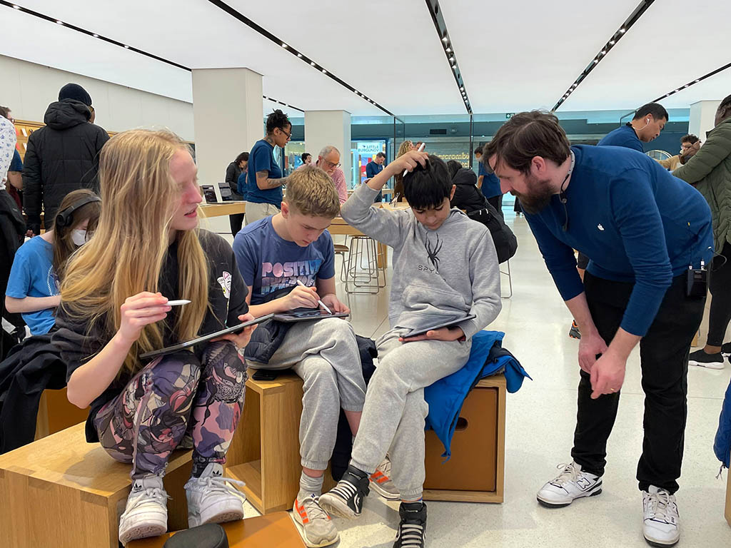 Students learning about digital art at a #TodayatApple Workshop.