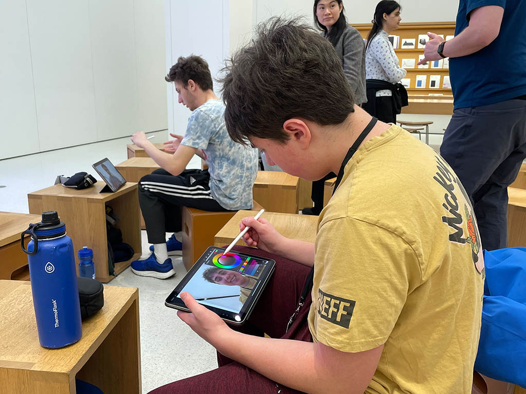 Students learning about digital art at a #TodayatApple Workshop.