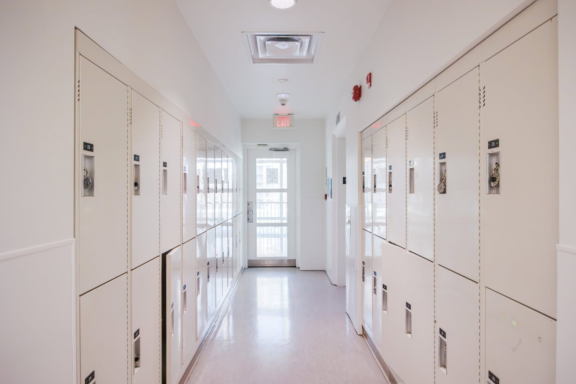 School lockers in a bright hallway at YMCA Academy.