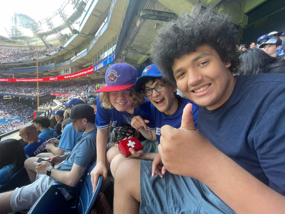 Group of kids enjoying a sports game at YMCA Academy.