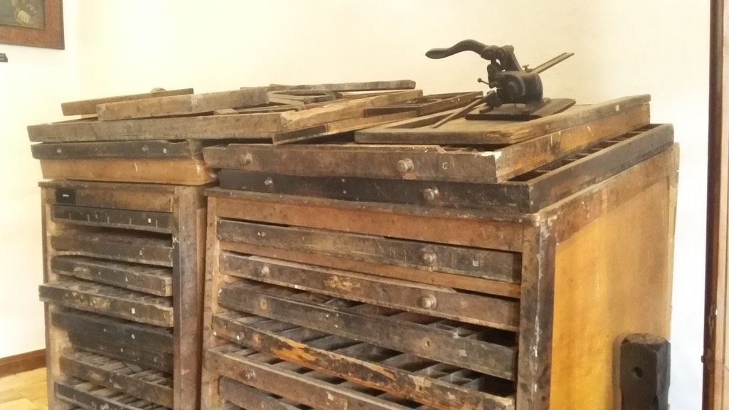 Cabinet that held the letters and numbers for the printing press
